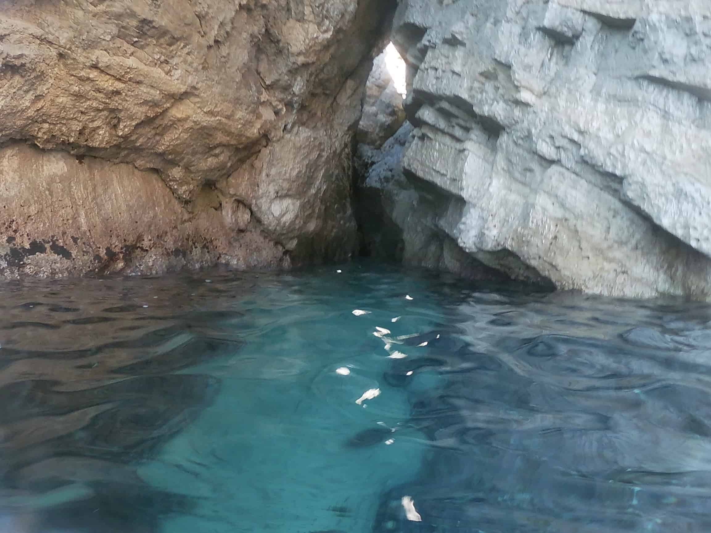 Blue Cave near Koločep Island glowing with turquoise light