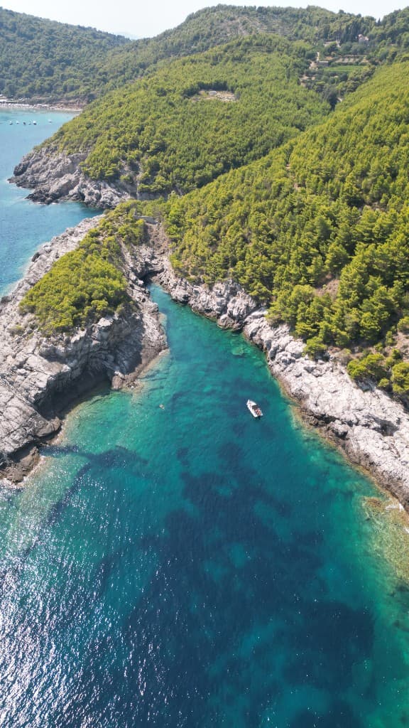 Aerial view of a secluded turquoise cove in the Elafiti Islands