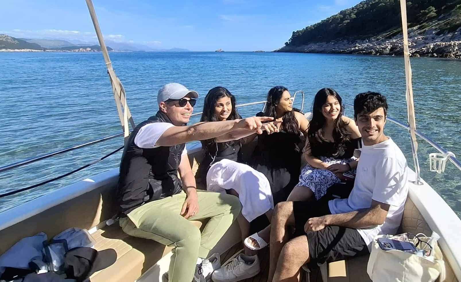 Speedboat cruising through turquoise Adriatic waters near Dubrovnik